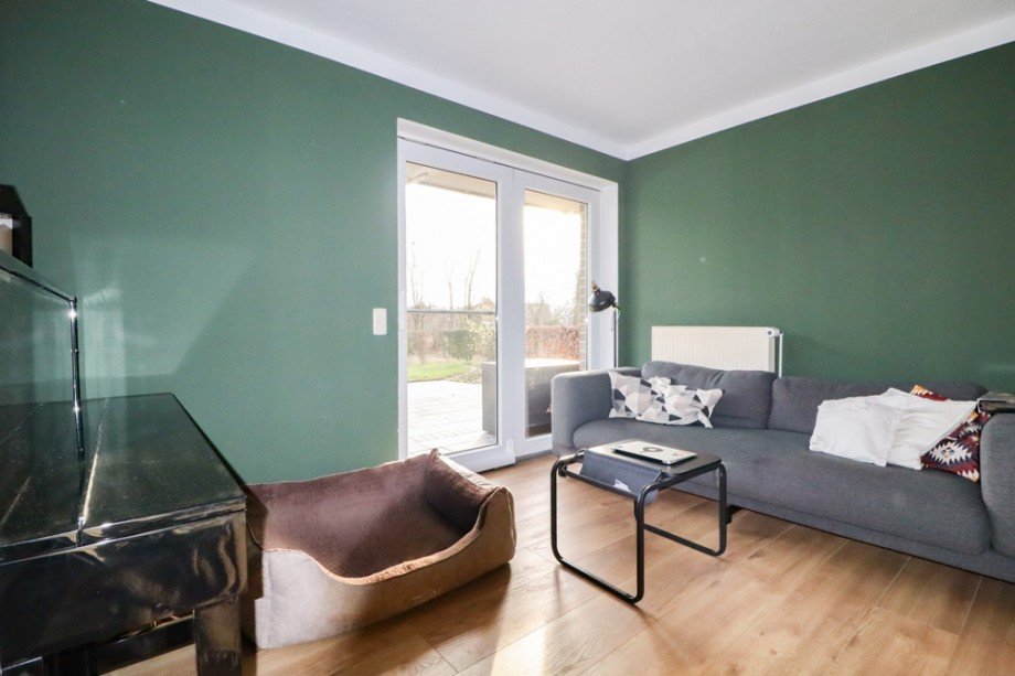 Wohnzimmer im EG Zweifamilienhaus Friesoythe