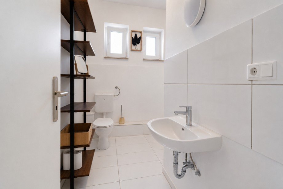 WHG 1 - Badezimmer Haus Apen / Godensholt